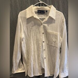 Women’s White lightweight long sleeve button down.